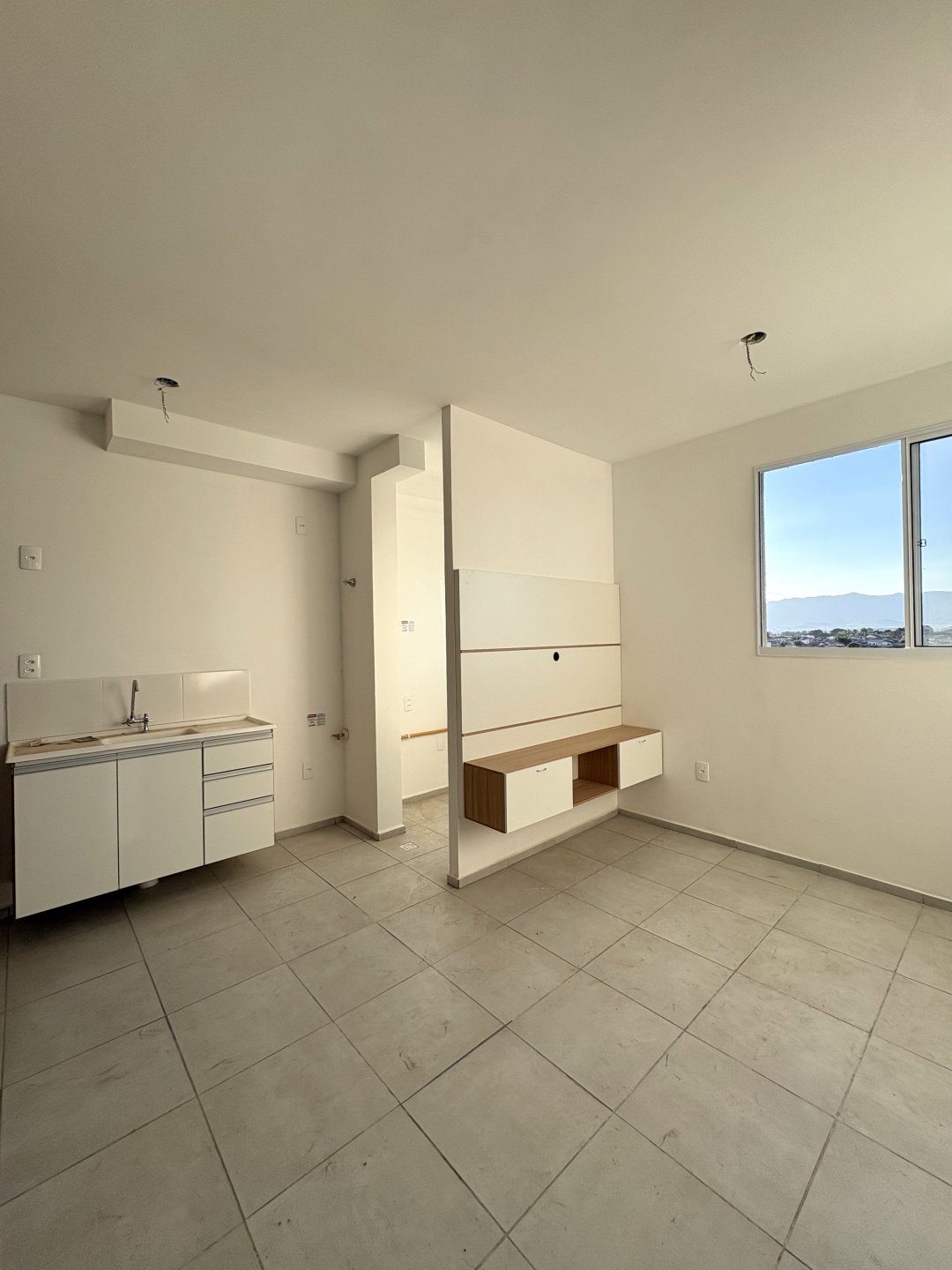 Sala e cozinha integradas do apartamento